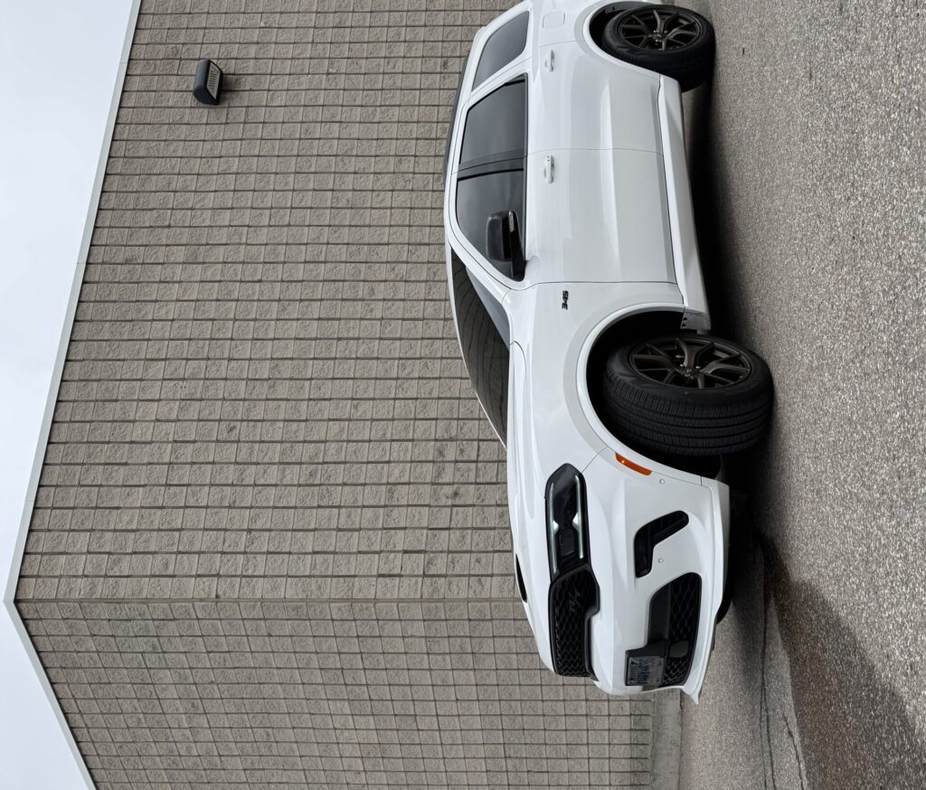 Vehicle with factory privacy glass and aftermarket window tint in Mississauga