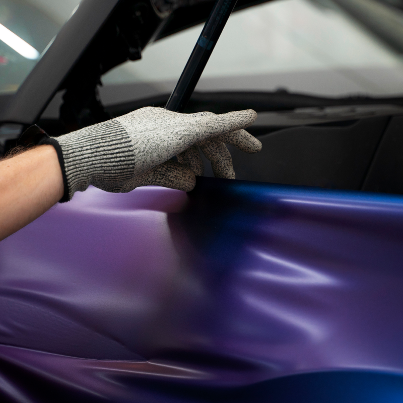 auto-service-salon-doign-car-wrapping 1 car wrap close up shot